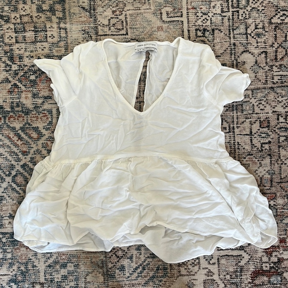 cute urban outfitters shirt with a little open back. perfect condition.